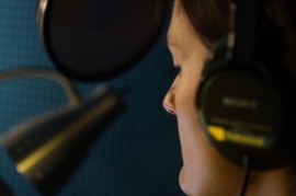 accented-english-voice-over-talent-in-audio-recording-studio